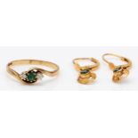 A 9ct gold emerald and diamond three stone ring, P, 1.5gms and a pair of rolled gold ear rings.