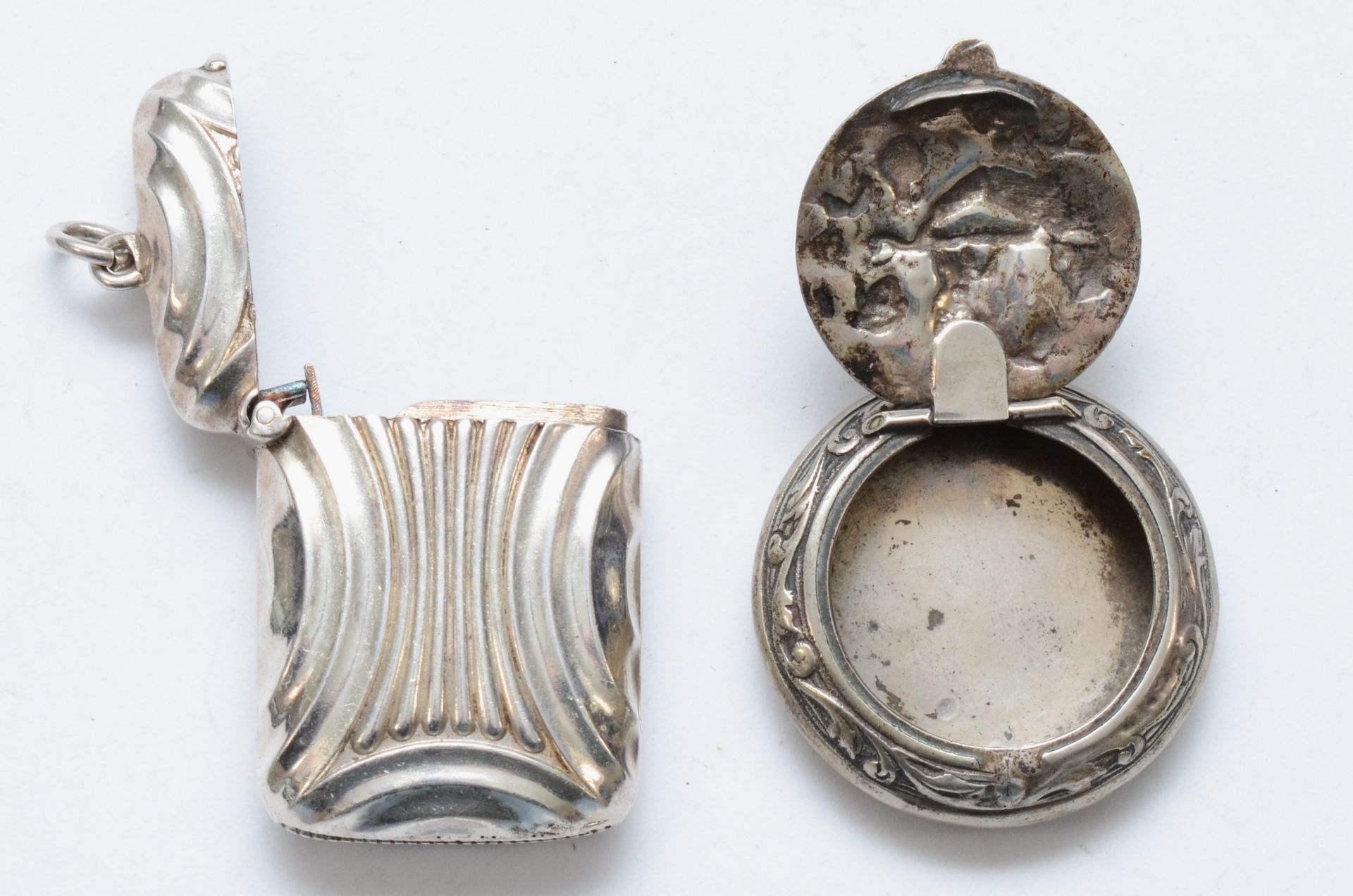 A Victorian electroplated vesta case and a circular silver pill box with Dutch sword mark. - Image 2 of 2