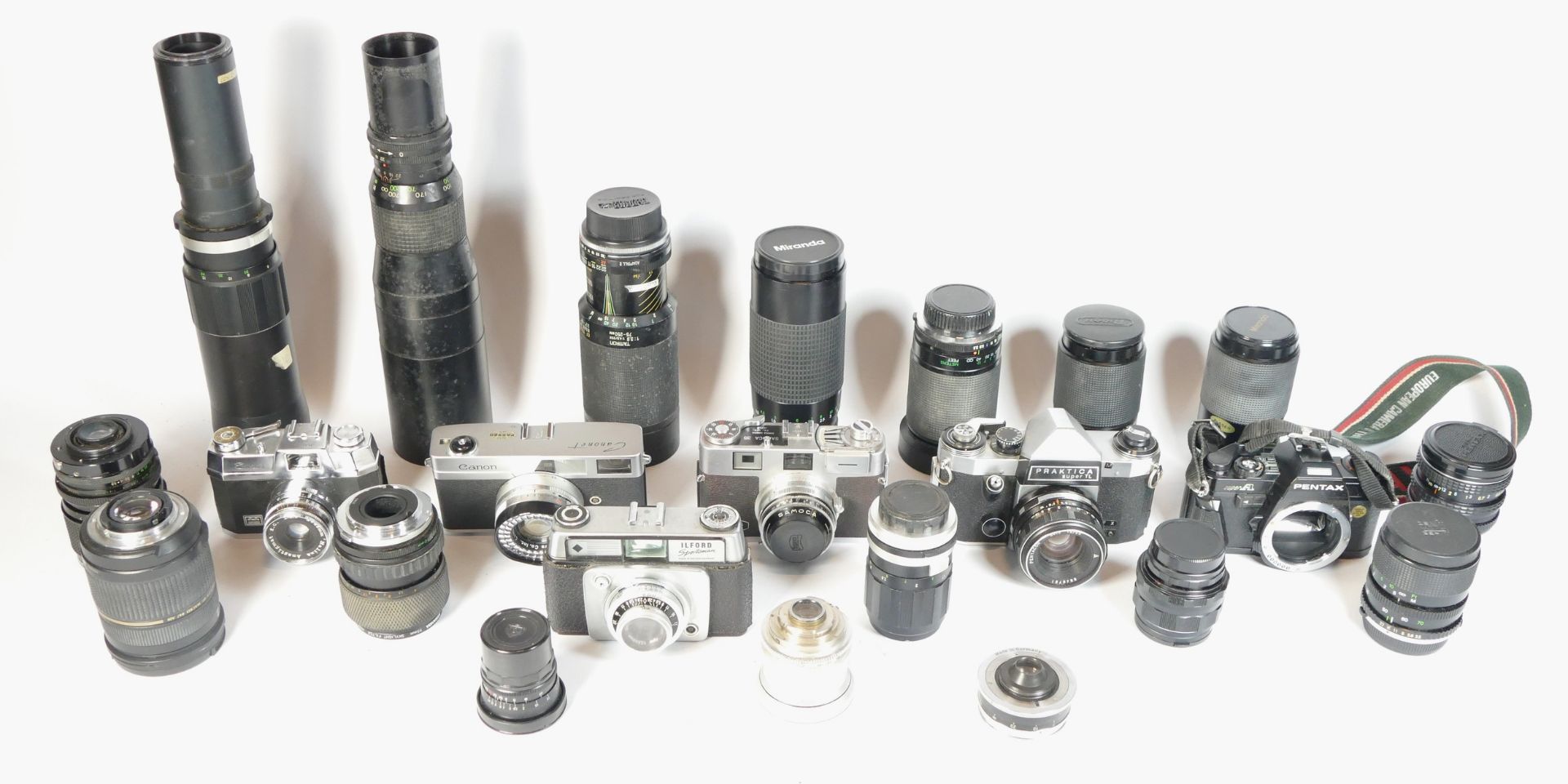 Six SLR vintage film cameras to include a Pentax Super A, a Samoca 35, a Halina 35x and an Ilford