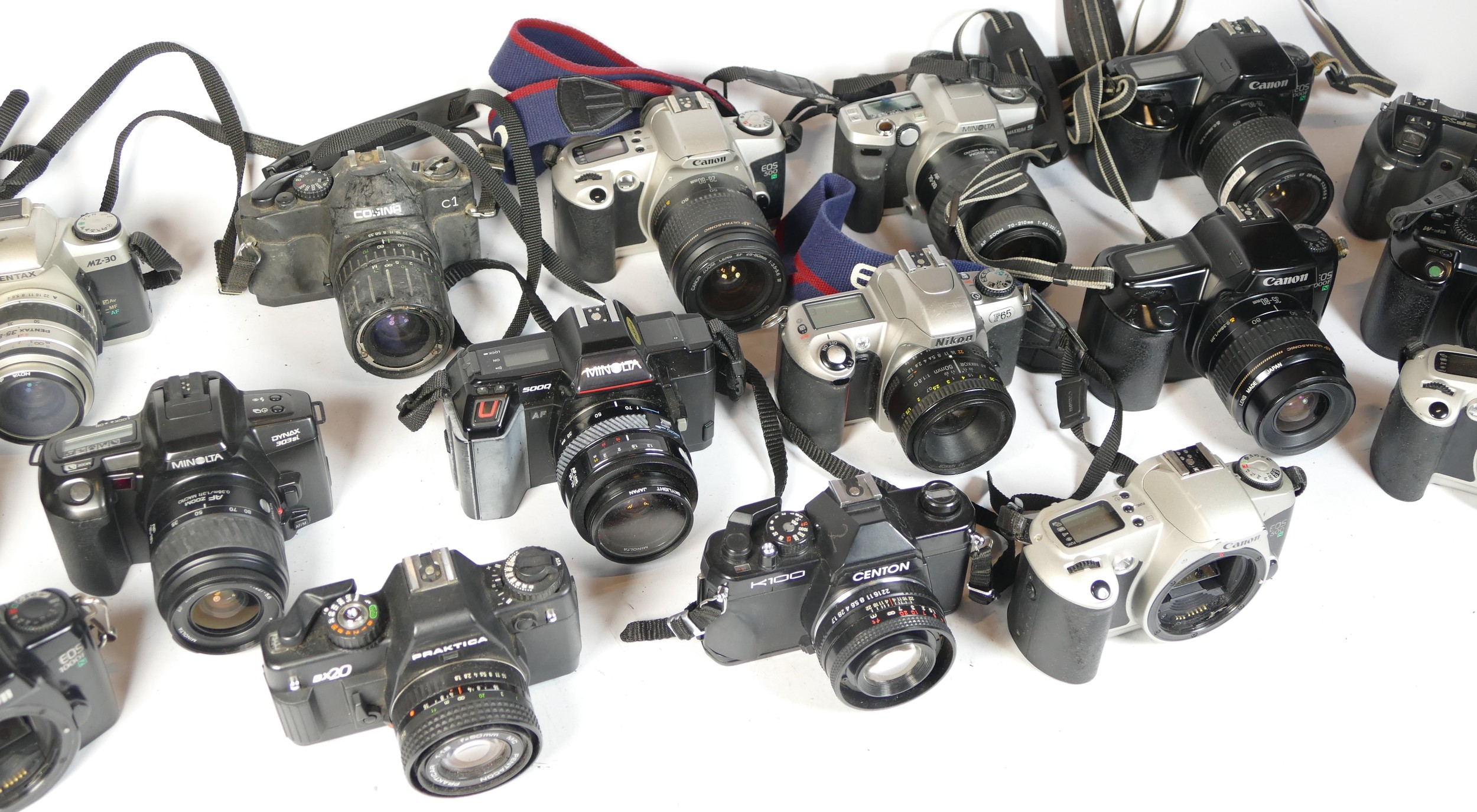Twenty five SLR vintage film cameras to include a Cosina C1, a Canon EOS 1000f, a Centon K100 and - Image 2 of 2