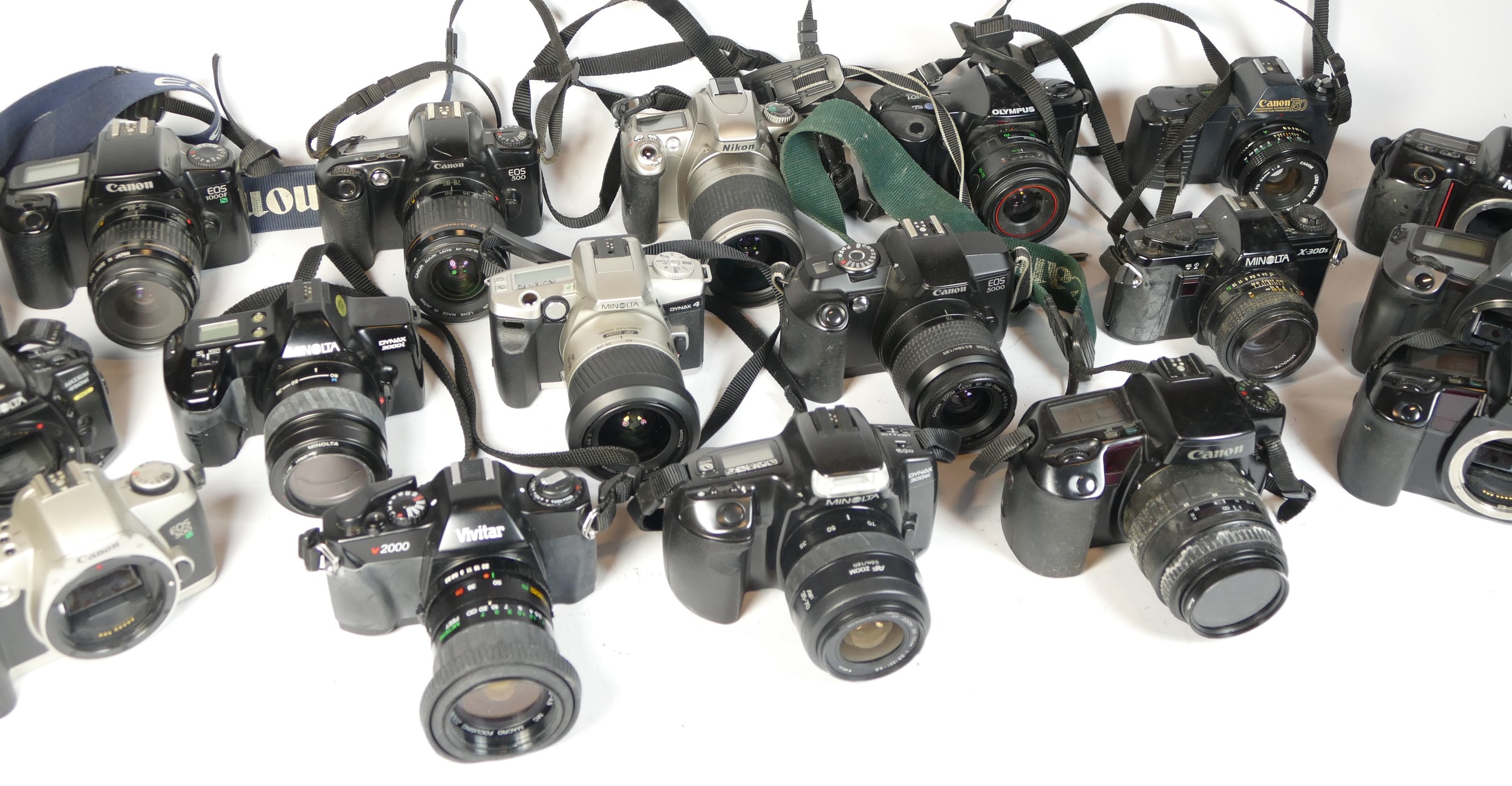 Twenty five SLR vintage film cameras to include a Canon EOS 100, a Canon EOS 500, a Minolta 7000 and - Image 2 of 2