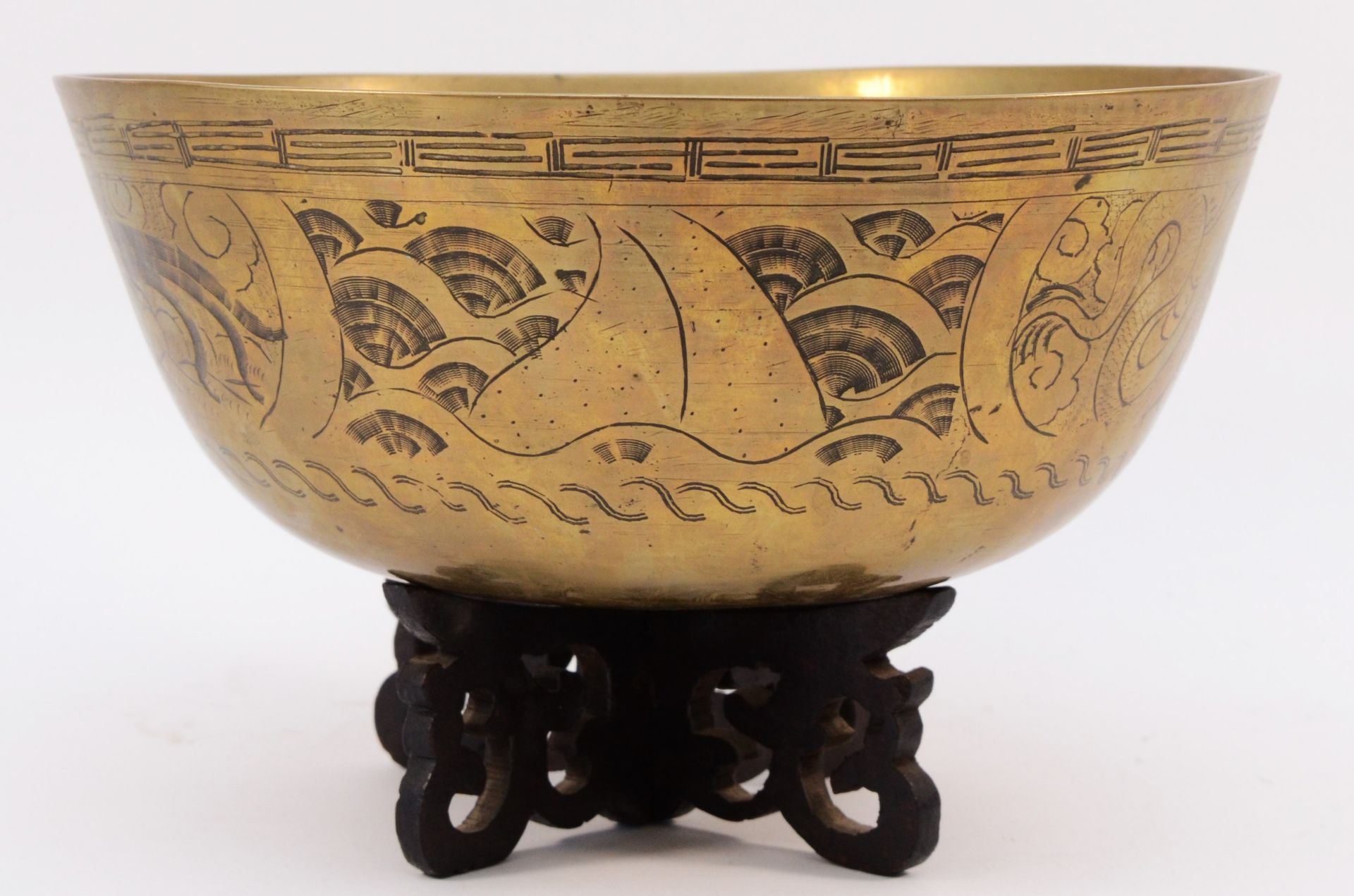 A 20th century Chinese brass singing bowl, engraved border with dragons in clouds, character mark to - Image 2 of 3