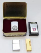 A Dunhill rollagas cigarette lighter, gold plated with engine turned case, together with three Zippo