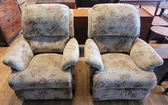 A pair of modern manual recliner armchairs, upholstered in a floral chenille fabric, W90, H100cm. (