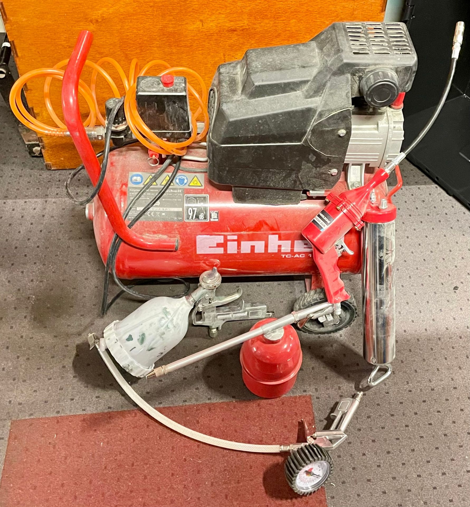 A Einhell 240 volt compressor, with associated airlines, grease gun and paint gun.