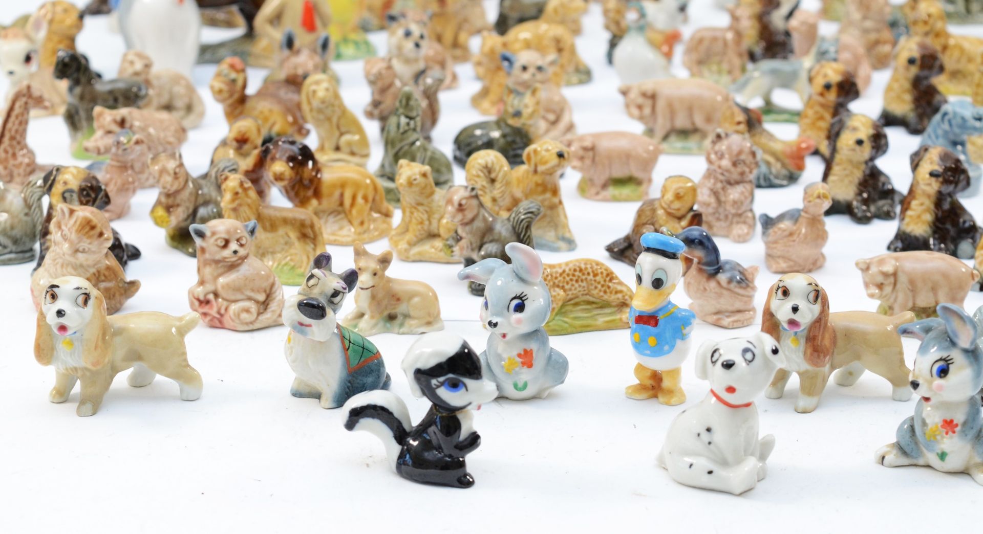 A large collection of Wade 'whimsies' porcelain figures and animal models, including Disney - Image 2 of 4