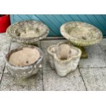 A pair of stoneware garden planters, 53cm diameter, together with two smaller examples. (3)