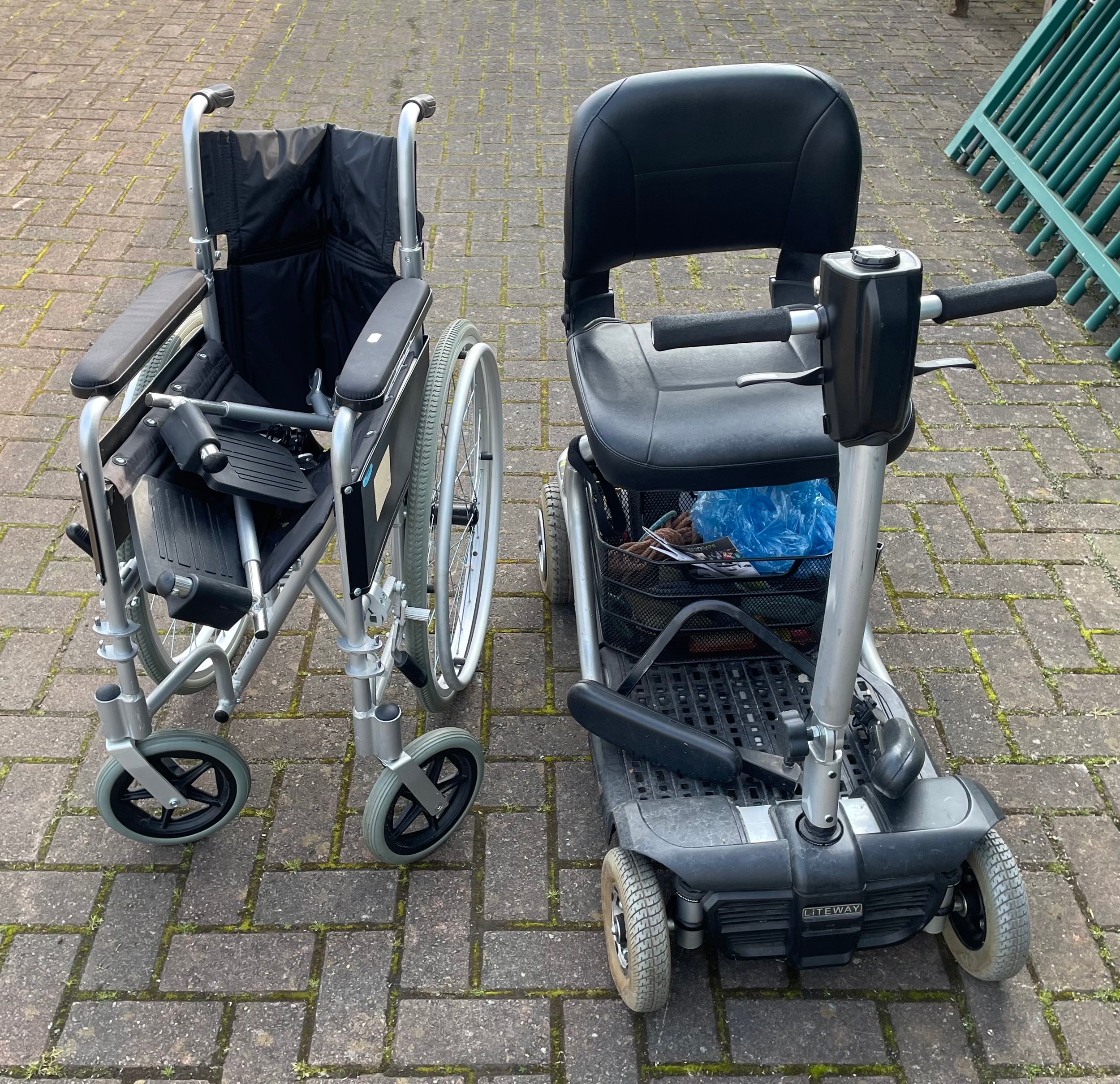 A Liteway folding mobility scooter, together with a folding wheelchair. (2)
