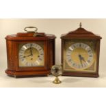 A modern mahogany case mantel clock, having 8 day movement stamped West Germany, striking on five