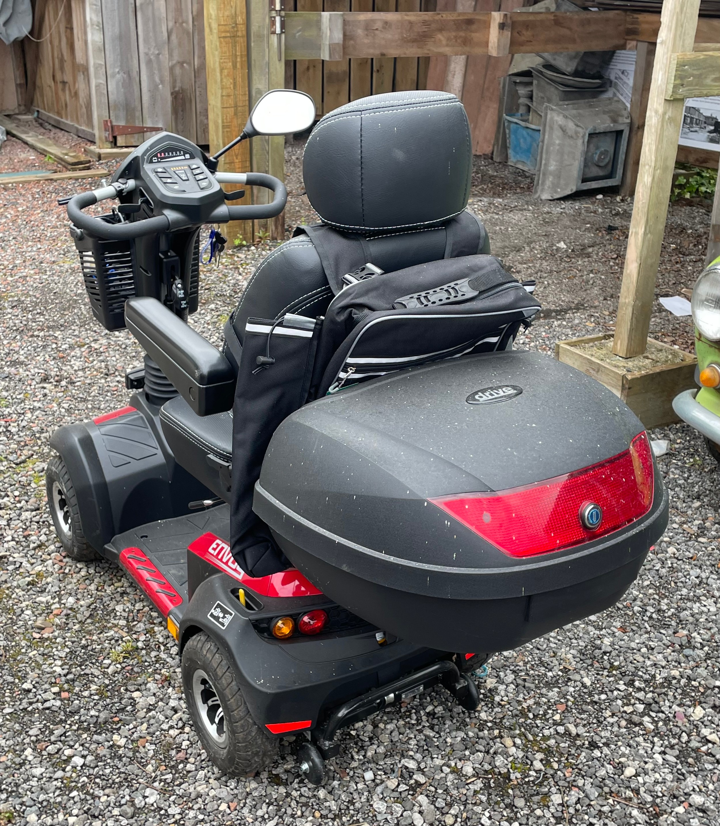 A four wheeled Envoy mobility scooter, complete with rear carrier, charger and keys. - Image 4 of 4