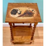 A 20th century oak side table with pokerwork decorated top, signed G. Gundill, having single