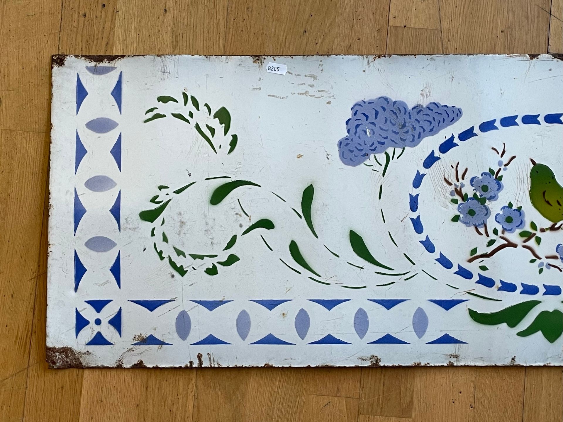 An early 20th century vitreous enamelled panel, depicting a bird amongst foliage. 122x38cm. - Image 2 of 5