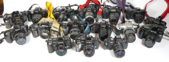 Twenty one SLR vintage film cameras to include an Olympus OM101, a Pentax P50, a Miranda MS-2 and