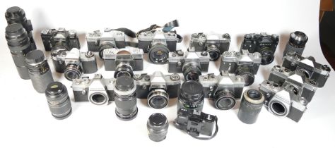 Sixteen SLR vintage film cameras to include a Praktica MTL3, a Praktica Tuova, a Fujica and a Chinon