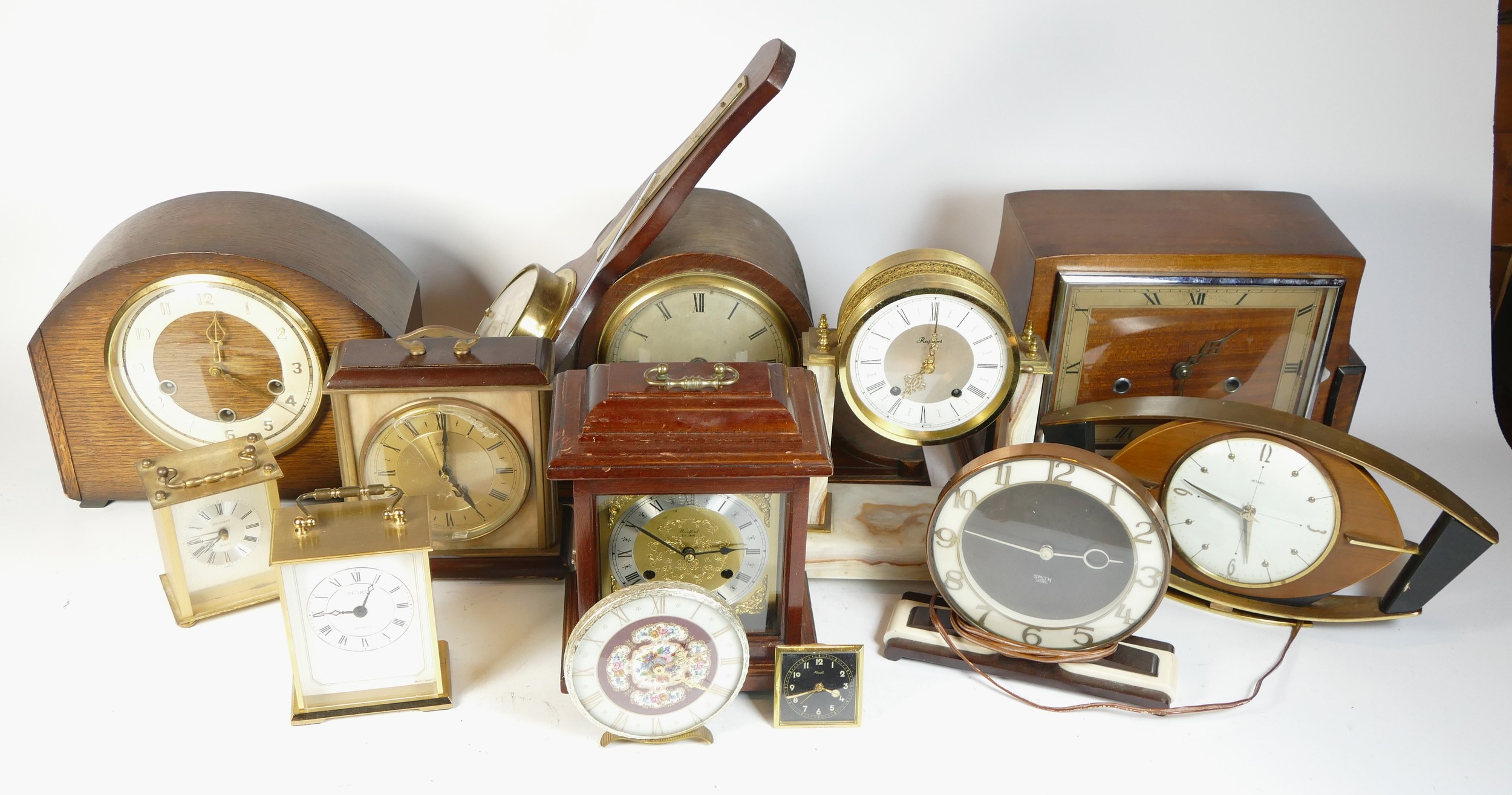 A collection of mid 20th century and later mantel clocks, alarm clocks and barometers in three - Image 3 of 3