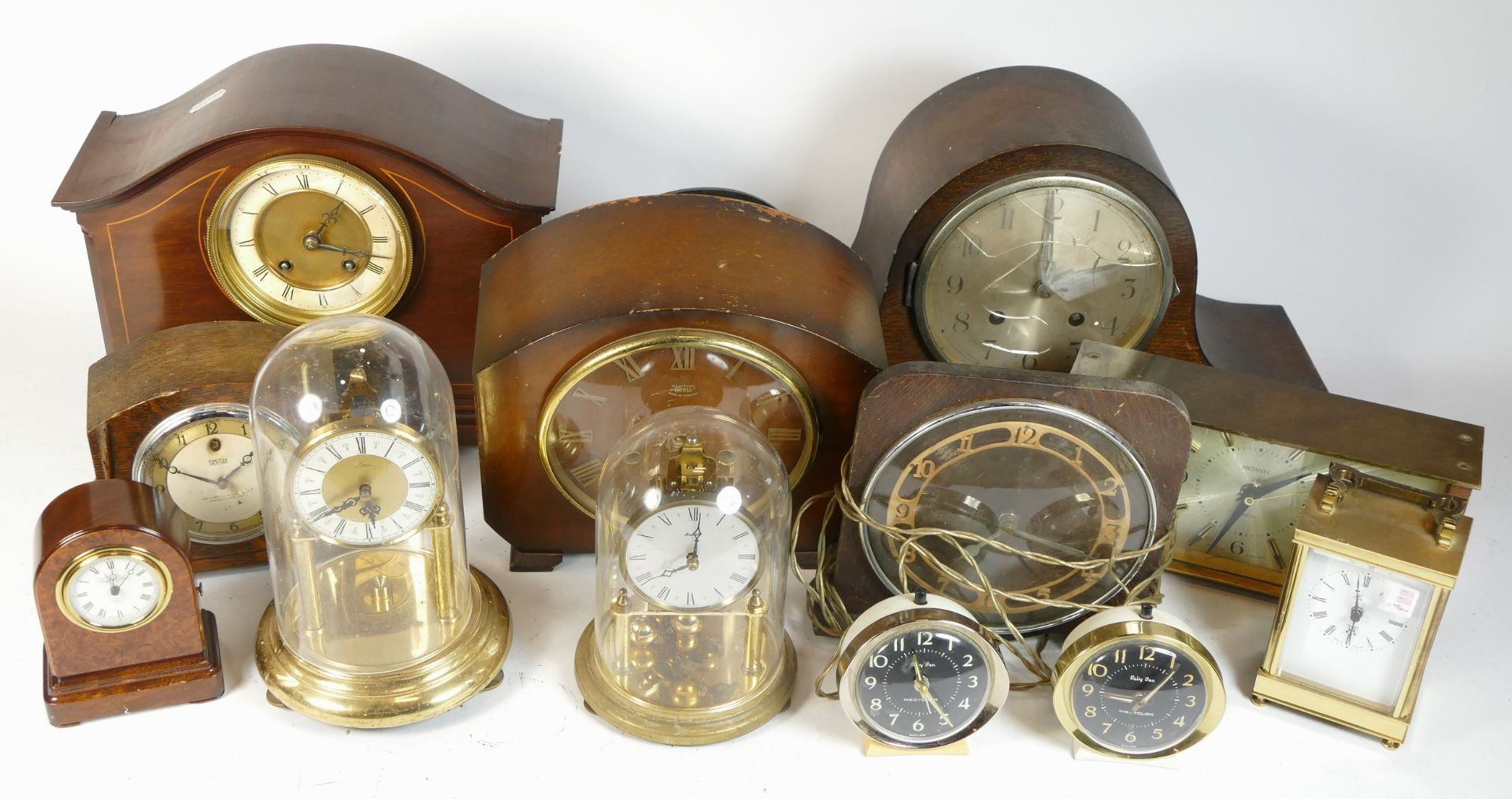 A collection of mid 20th century and later mantel clocks, alarm clocks and barometers, in three - Image 3 of 3