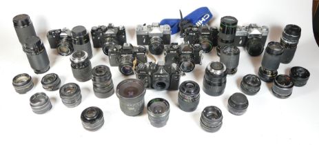 Eight SLR vintage film cameras to include a Zenit TTL, a Chinon CE-4, a Zenit 11 and a Cosina CS-
