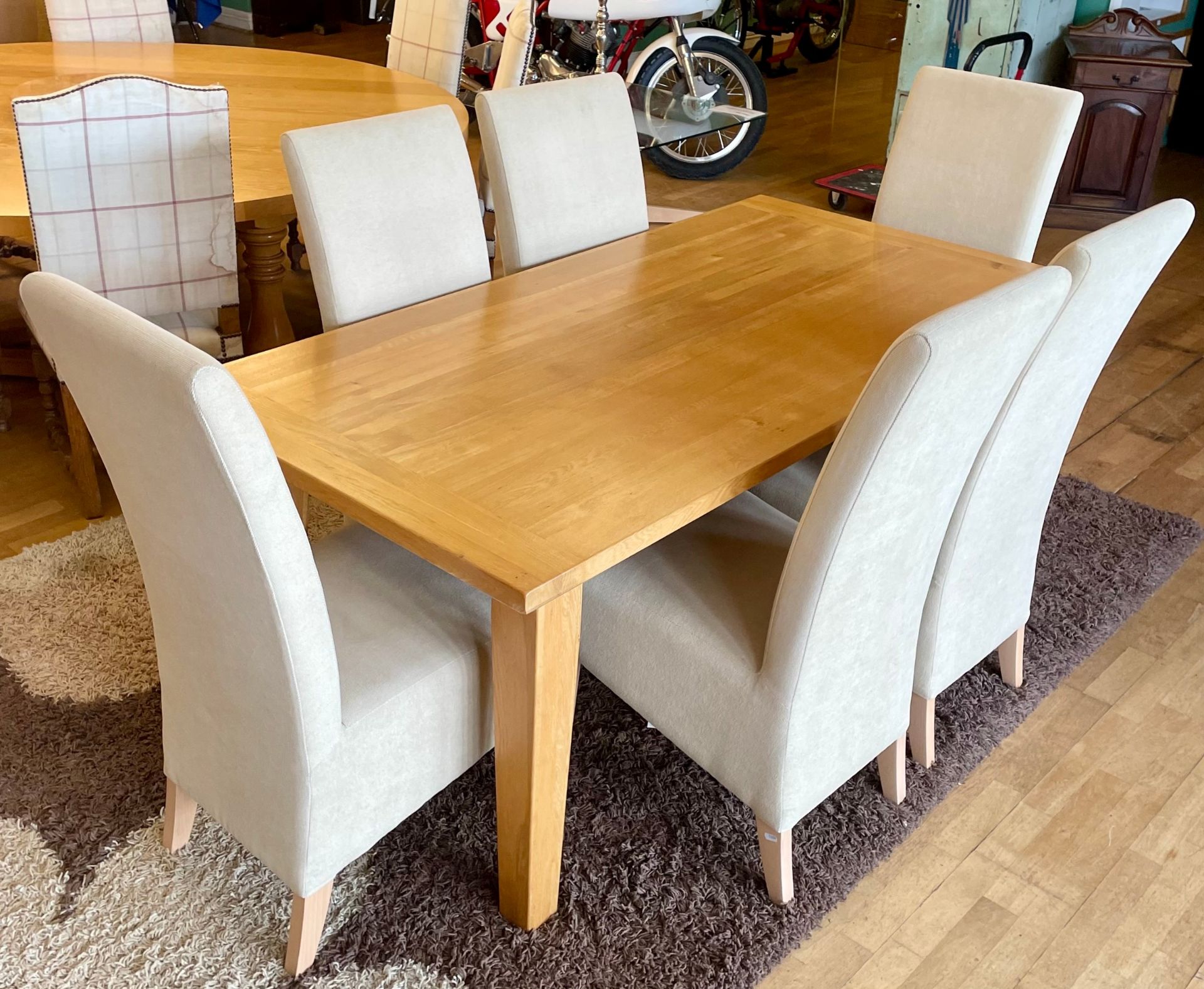 A modern solid light oak dining suite, comprising rectangular top table on square tapered legs, with - Image 2 of 3