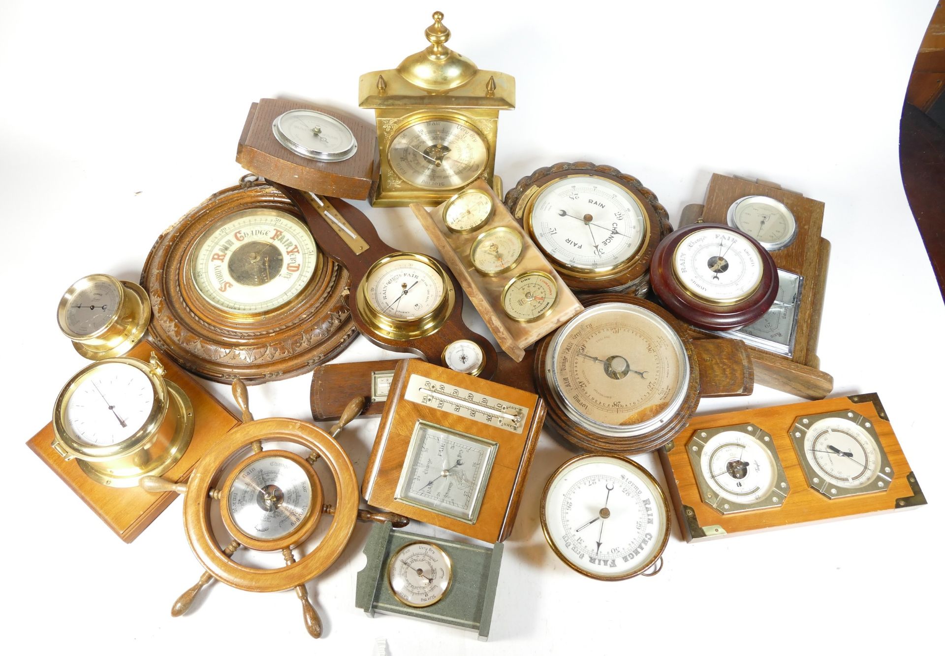 A collection of mid 20th century and later barometers in two boxes. (2)