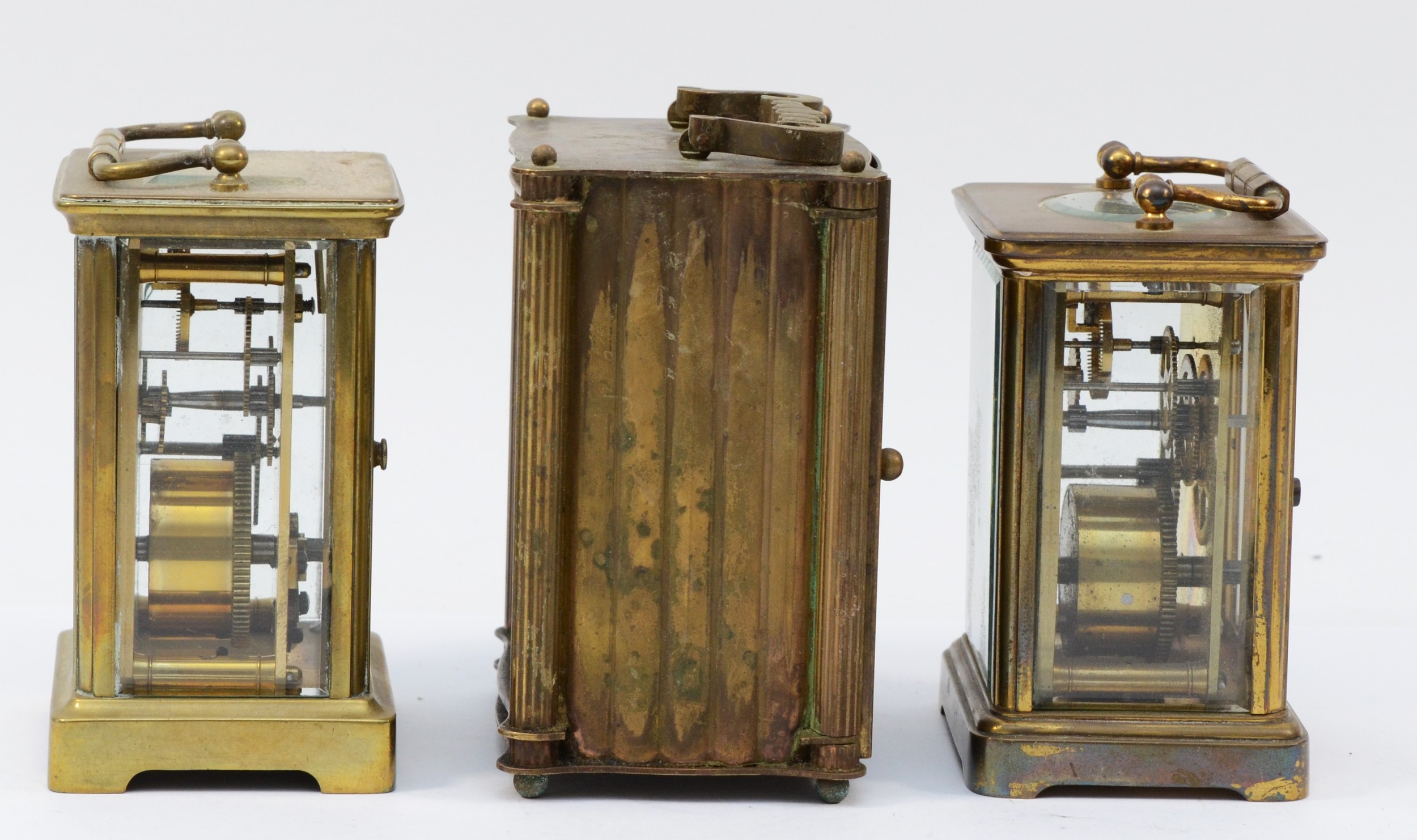 Three mid 20th century carriage clocks, having 8 day movements with floating balance enamelled dials - Image 4 of 5