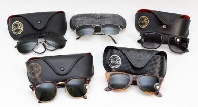 Ray-Ban; five cased pairs of sunglasses, to include 'Clubmaster' RB3016, Wayfarer, Justin RB4165. (