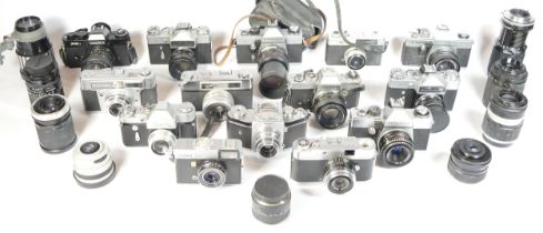 Fourteen SLR vintage film cameras to include a Yashica FR, a Hanimex Holiday 35, a Yashica FR1,