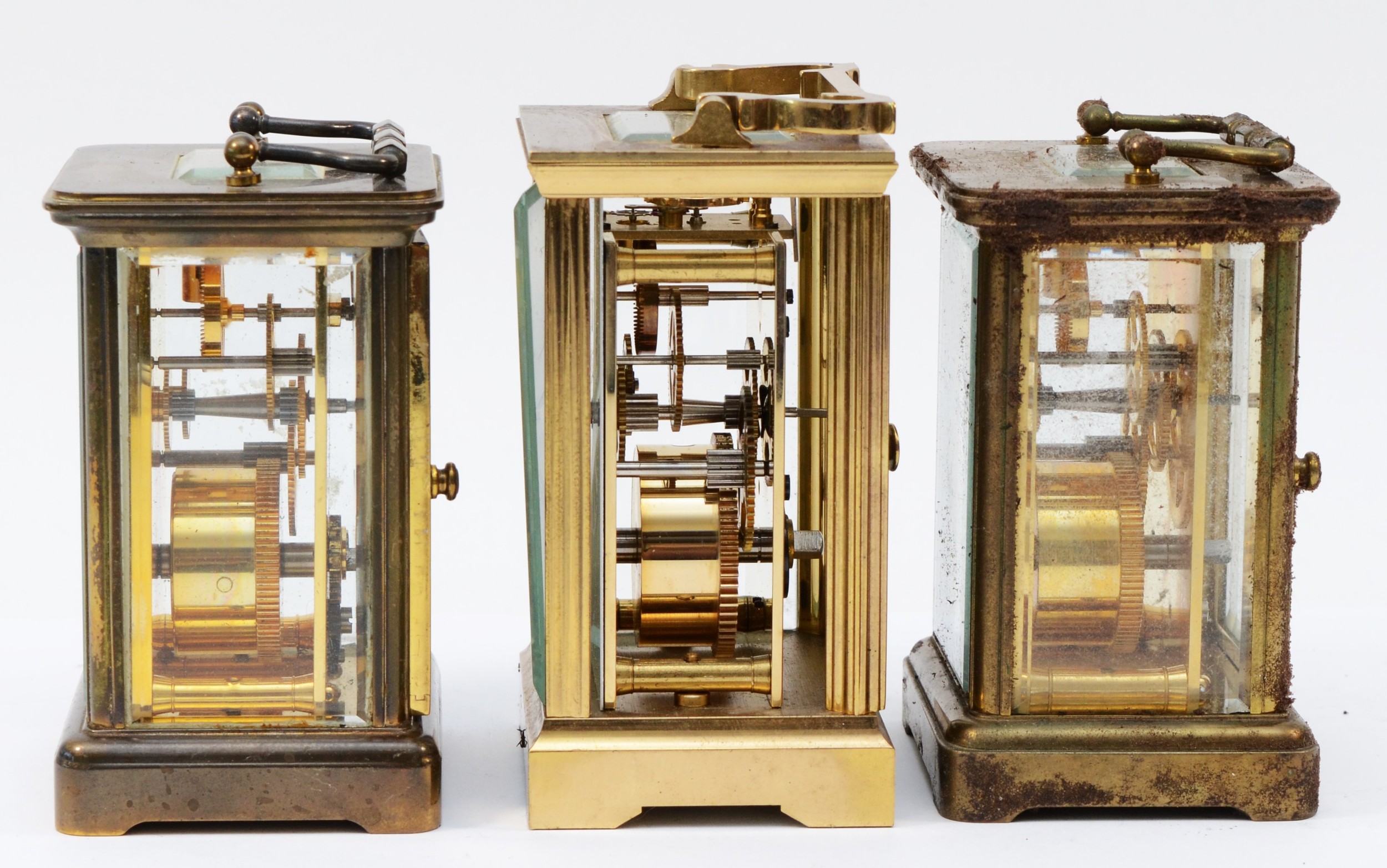 Three brass cased carriage clocks, circa late 20th century, having enamelled dials with Roman - Image 4 of 5