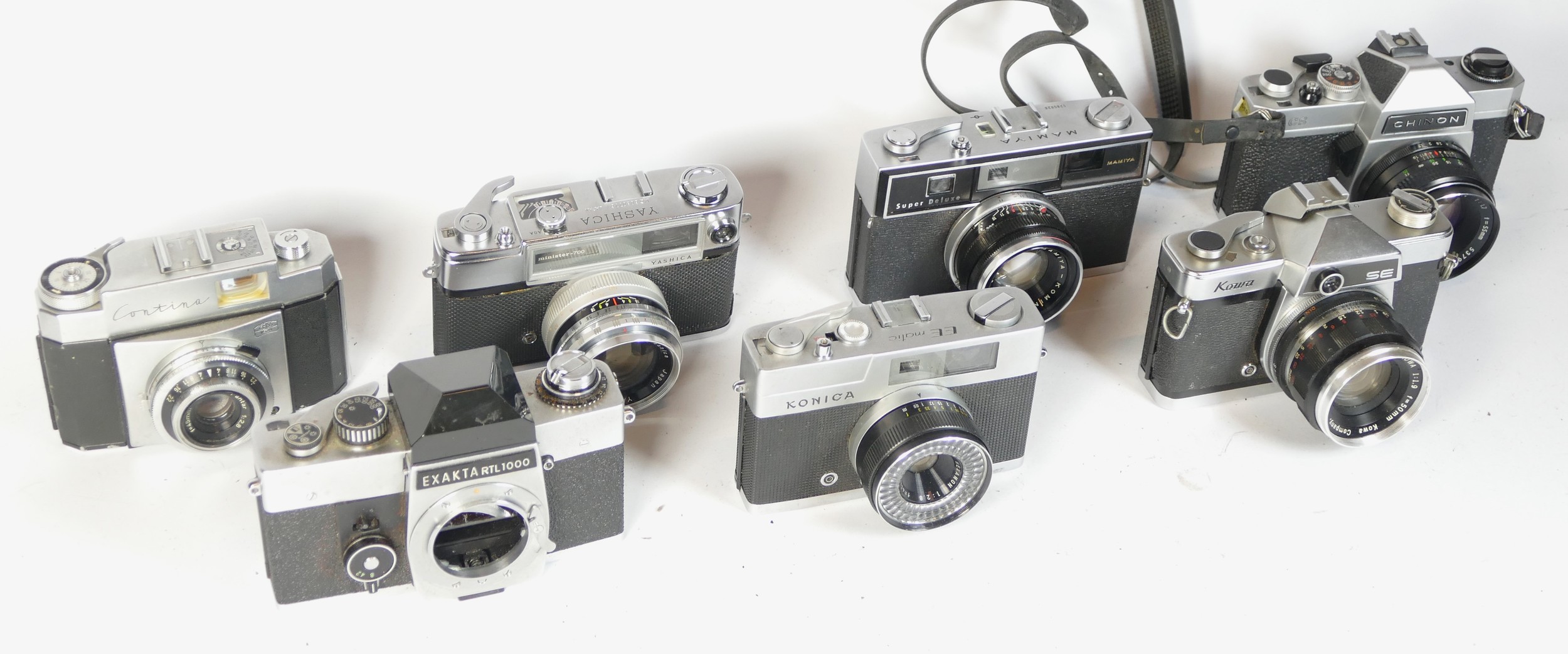 Seven SLR vintage film cameras to include a Mamiya Super Deluxe, a Yashica Minister 700, a Chinon CS - Image 3 of 4