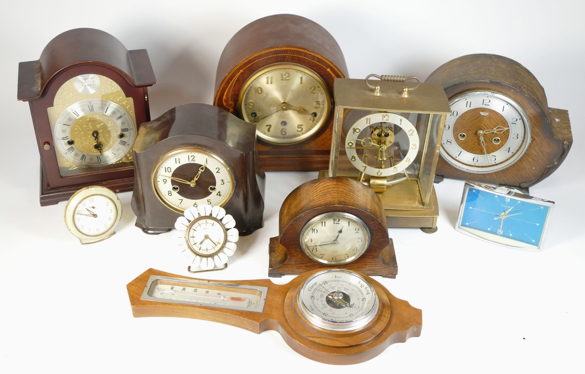 A collection of mid 20th century and later mantel clocks, alarm clocks and barometers in three - Image 3 of 3