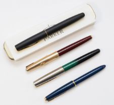 Parker Slimfold, a blue cased fountain pen with 14K nib, reservoir filling, Parker, a red cased with