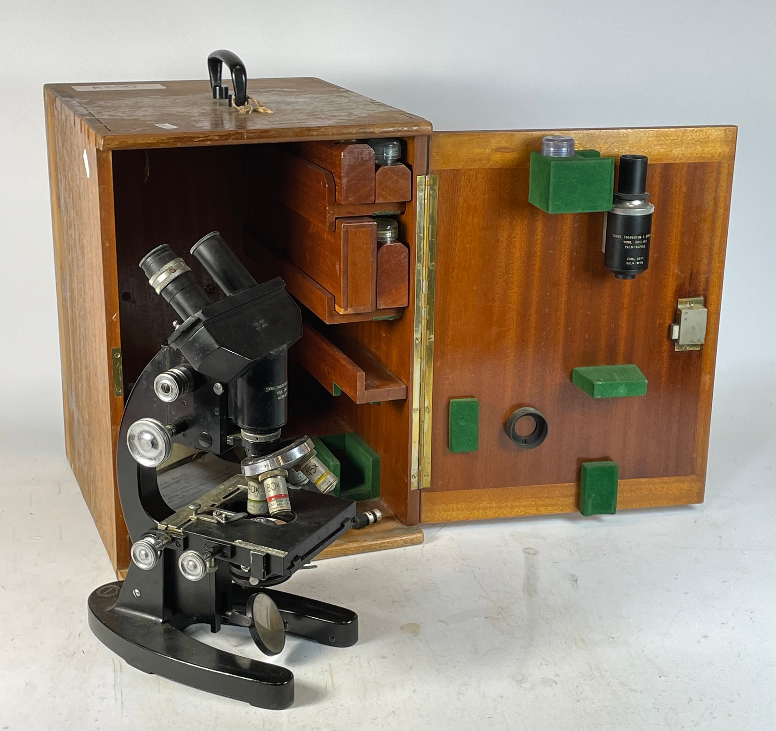 An early 20th century Hawksley & Sons laboratory microscope, model M201295, complete with mahogany