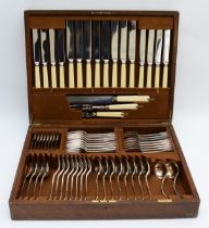 A Mappin & Webb oak cased canteen of cutlery, comprising sixty five pieces 'Princess Plate'