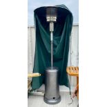 A large Calor gas fired patio heater with cover, together with a Brabantia rotary washing line and