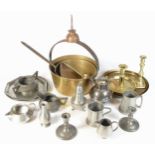 A collection of 20th century brass and pewter wares, to include Jam pans, candlesticks, sugar