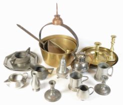 A collection of 20th century brass and pewter wares, to include Jam pans, candlesticks, sugar