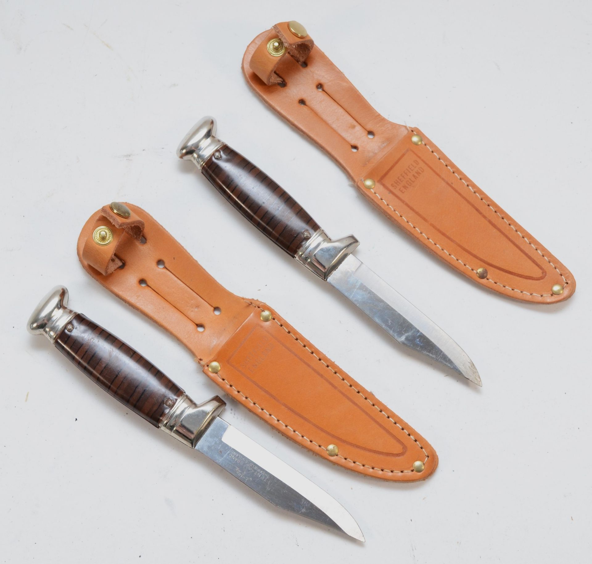 A pair of mid 20th century sheaf knives, the blades stamped Sheffield England.