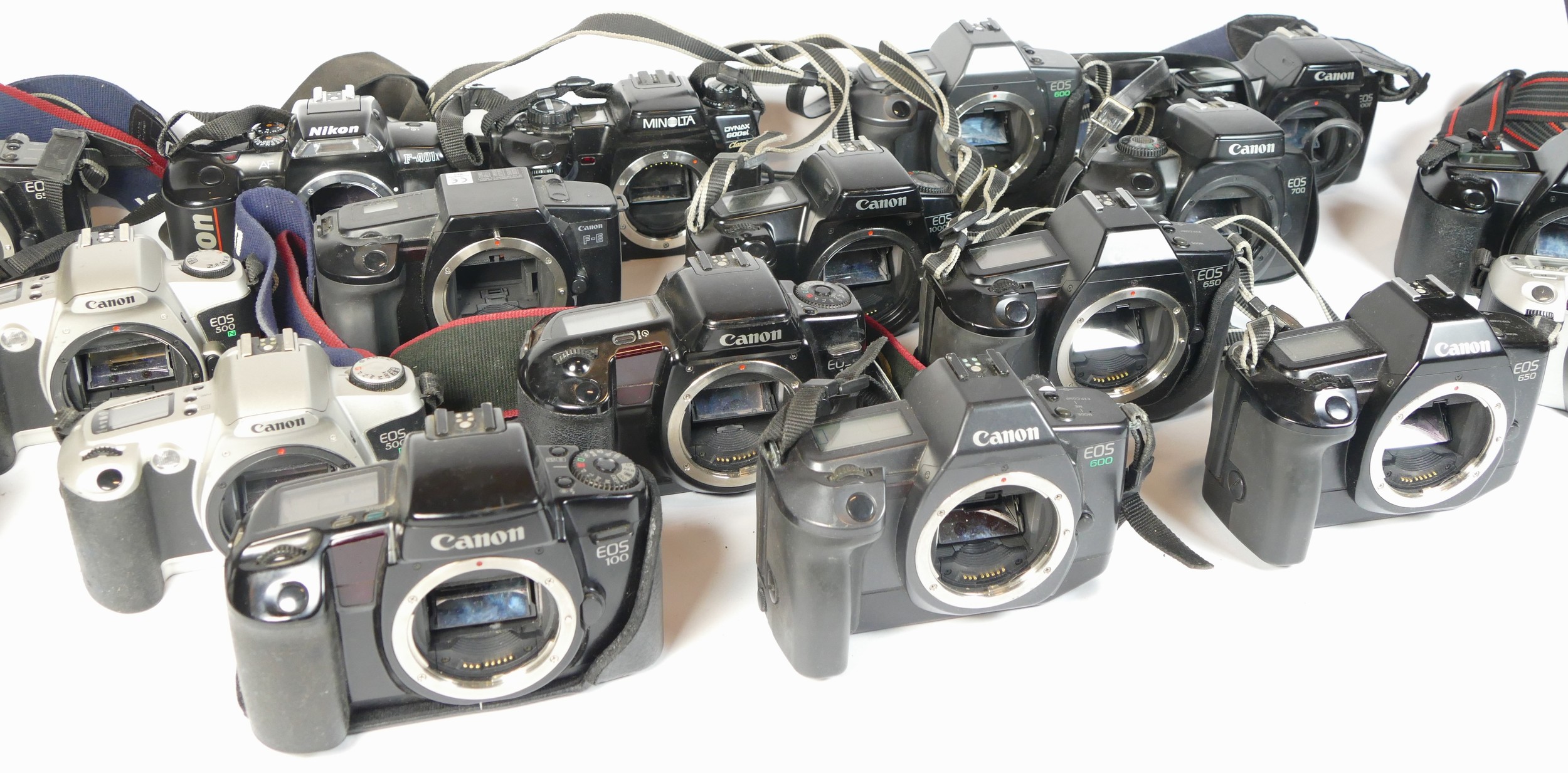Twenty four SLR vintage film cameras to include a Canon EOS 500N, a Canon EOS 700, a Nikon F-401x - Image 2 of 2