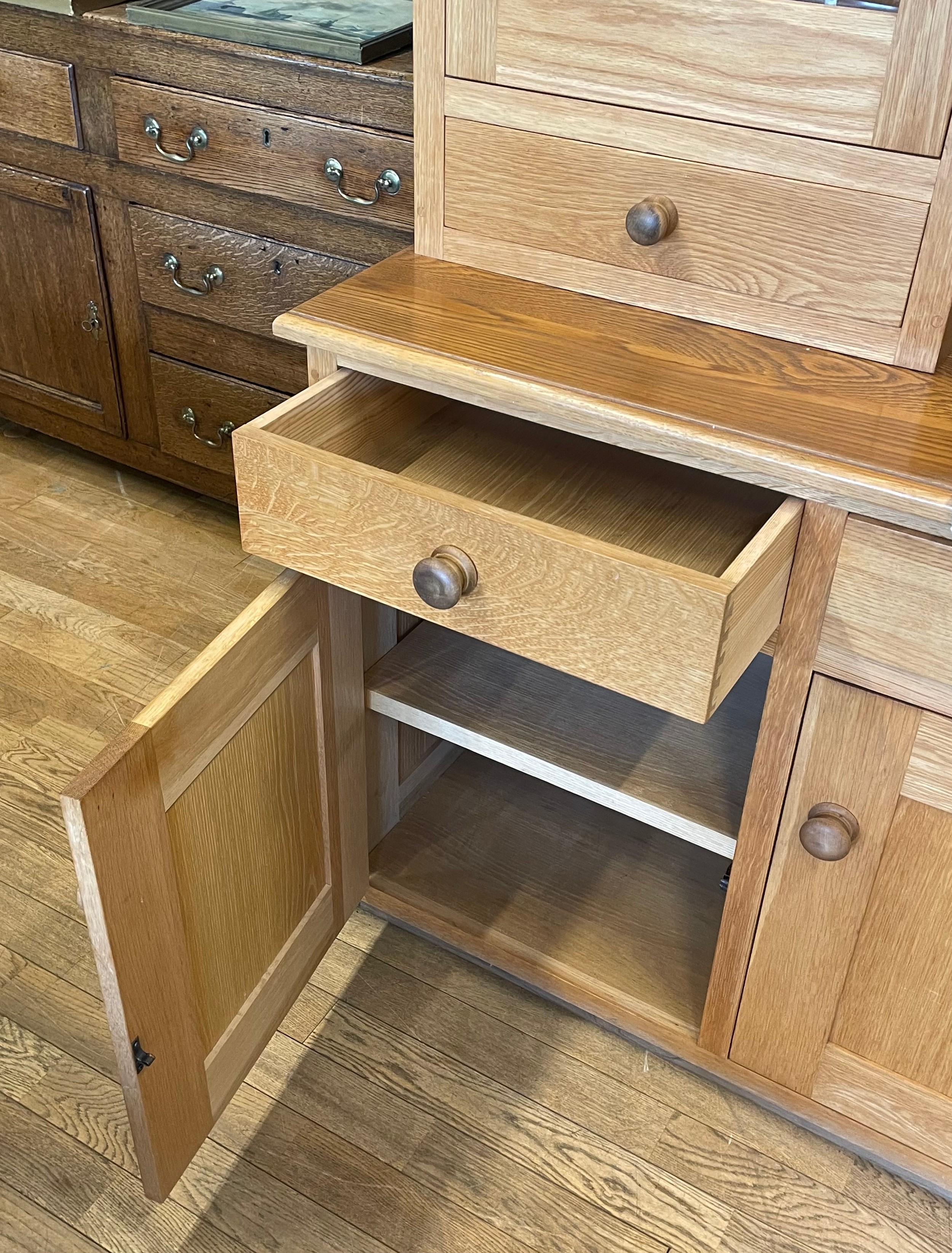 A modern light oak kitchen dresser,the flared cavetto cornice over a central bank of three fitted - Image 2 of 2