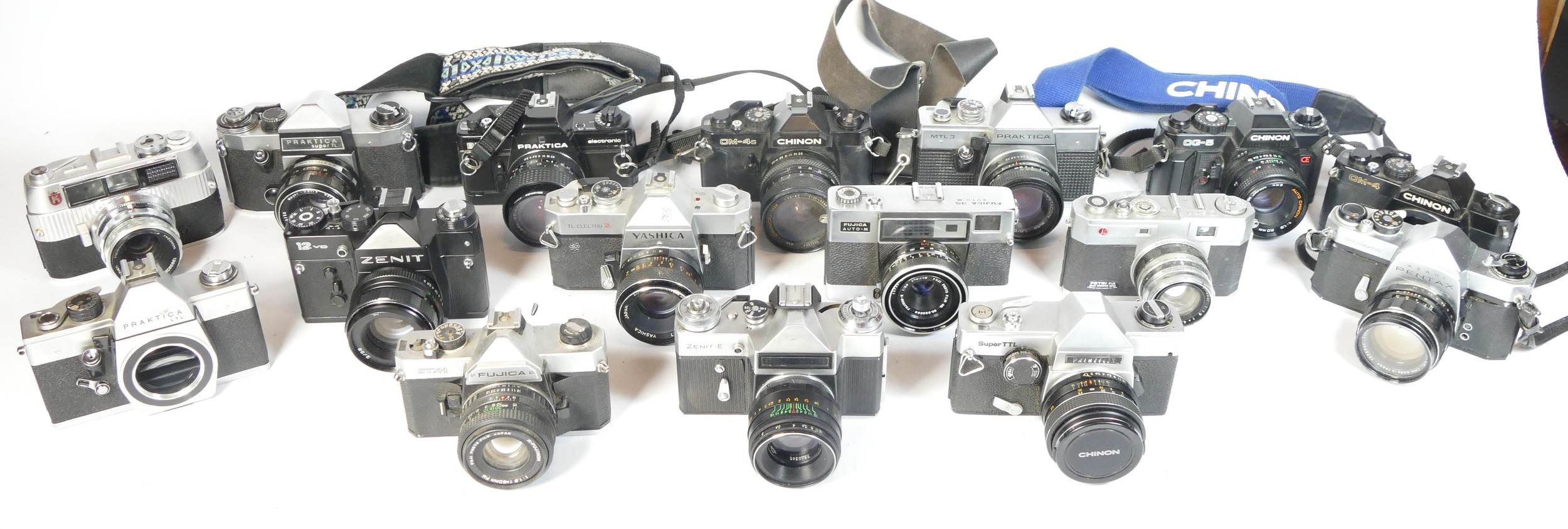 Twenty one SLR vintage film cameras to include a Praktica LB, a Fujica STX-1, a Chinon CM4S, and a