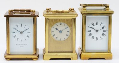 Two French 20th century brass case carriage clocks, one striking on gong, together with an English