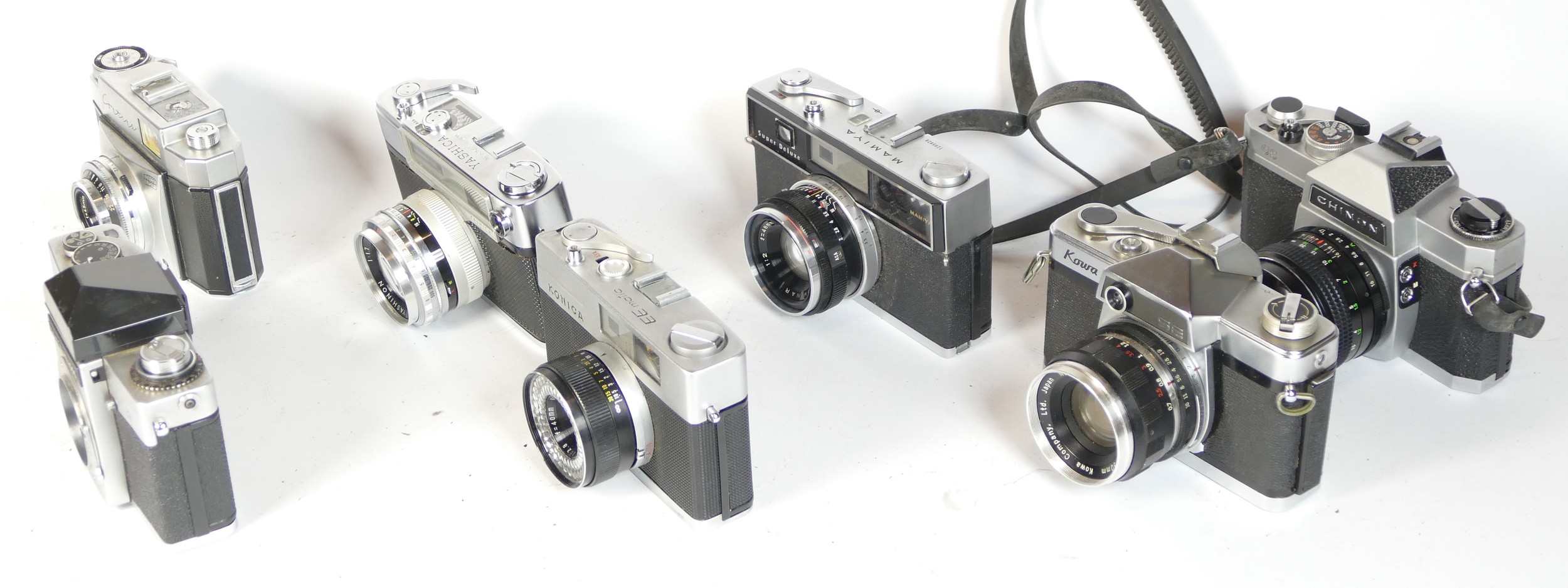 Seven SLR vintage film cameras to include a Mamiya Super Deluxe, a Yashica Minister 700, a Chinon CS - Image 2 of 4