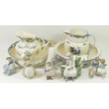 Six Nao porcelain figurines, together with two pairs of Edwardian pottery jug & bowl sets. (2)