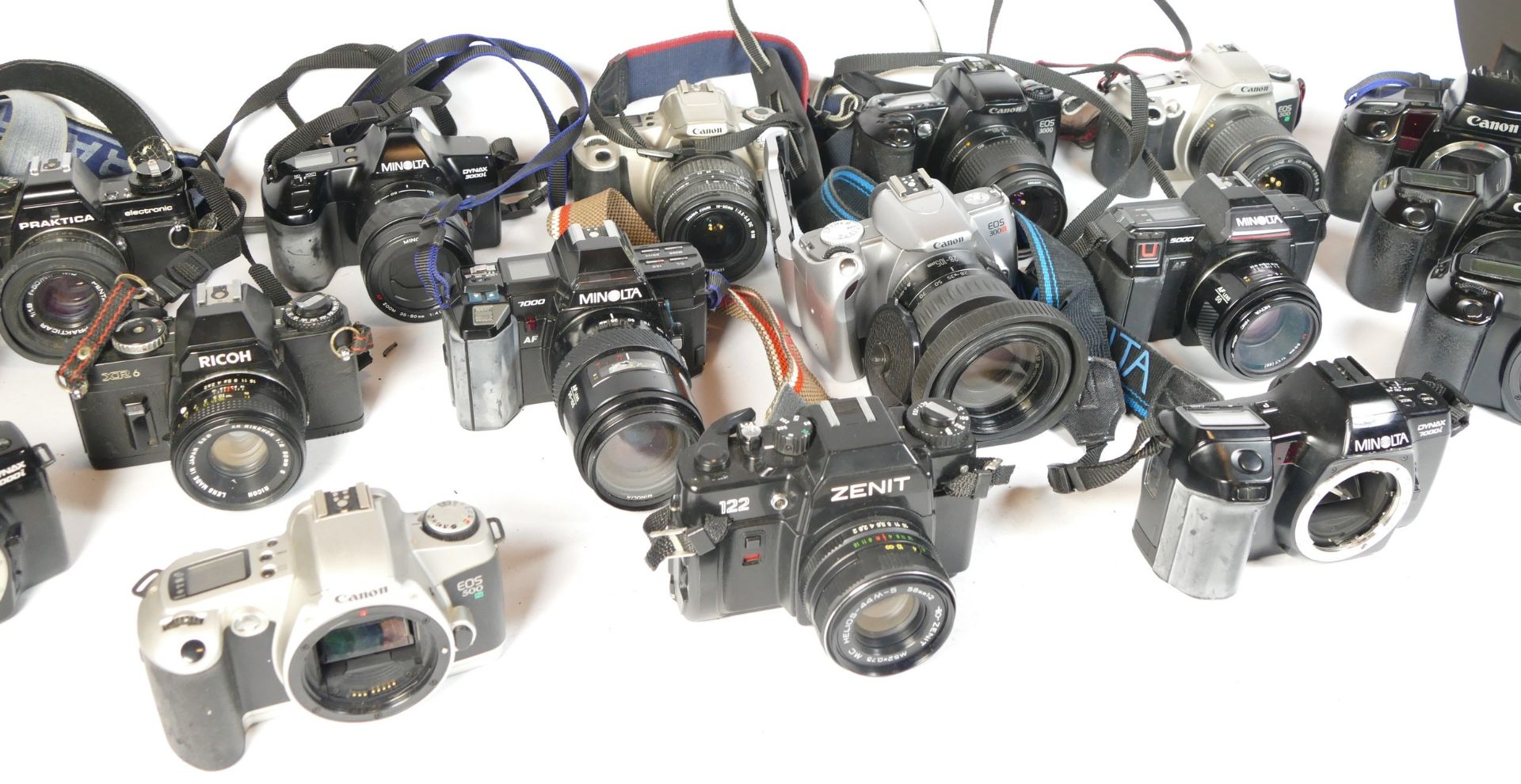 Twenty four SLR vintage film cameras to include a Canon EOS 500N, a canon EOS 3000, a Minolta - Image 2 of 2