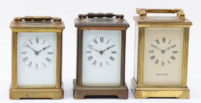 Two 20th century English 8 day brass carriage clocks, together with a French example. (3)