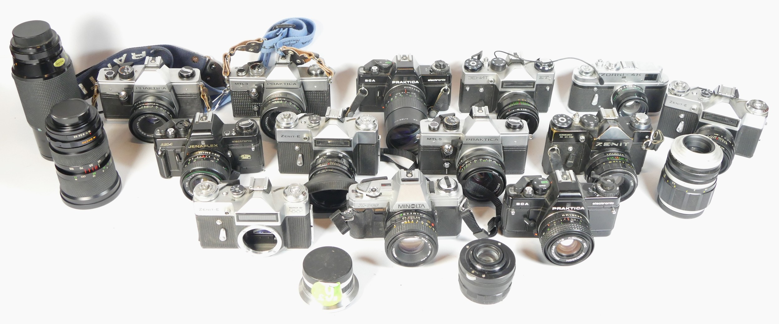 Fourteen SLR vintage film cameras to include a Praktica BCA, a Zenit E, a Minolta x-300 and a