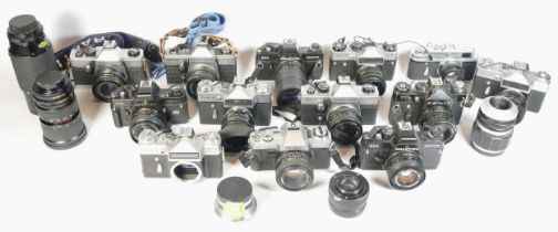 Fourteen SLR vintage film cameras to include a Praktica BCA, a Zenit E, a Minolta x-300 and a