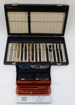 A collection of twenty fountain pens, various makes, mainly un-named, together with a 30 fountain