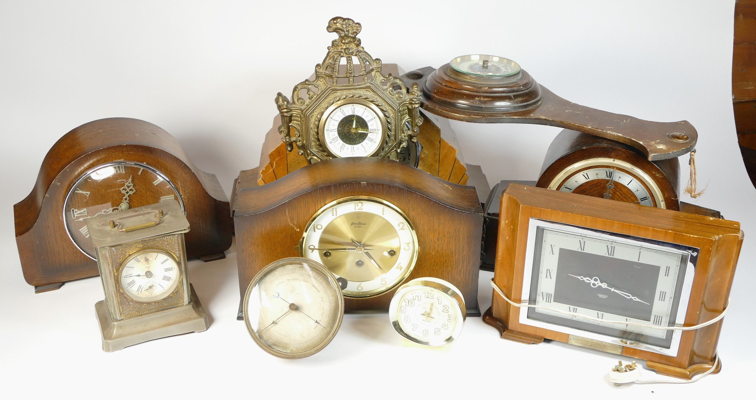 A collection of mid 20th century and later mantel clocks, alarm clocks and barometers in three - Image 2 of 3