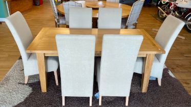 A modern solid light oak dining suite, comprising rectangular top table on square tapered legs, with