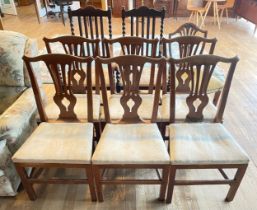 A set of six Edwardian oak dining chairs, together with a pair of carver chairs and a mahogany